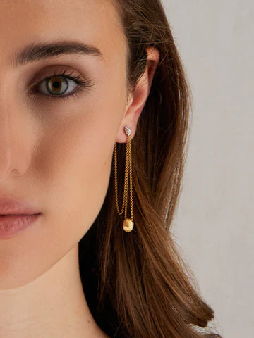 "LUCE" long pendant earrings in gold and diamonds