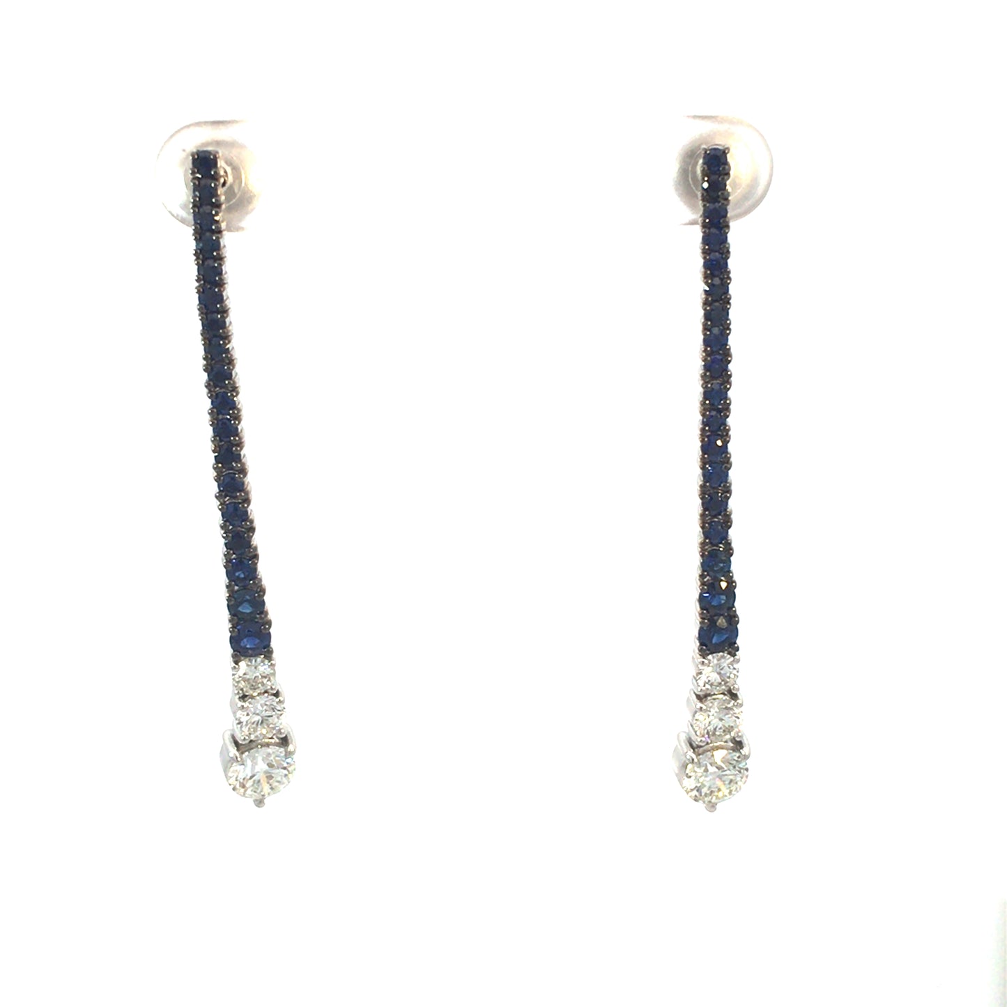 White gold earrings with white diamonds and blue sapphires